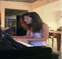 She is a self-taught pianist.